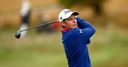 Slender lead for rookie Smith
