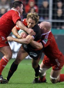 Toulon fly half Jonny Wilkinson being tackled against Munster in 2011 Toulon fly half Jonny Wilkinson being tackled against Munster in 2011