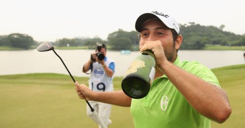 Alexander the great: Frenchman Levy knocks back the champagne after winning in China