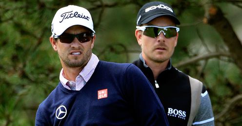 Henrik Stenson (right) is one player aiming to overtake champion Adam Scott