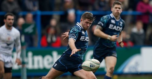 Cardiff Blues scrum half Lewis Jones kicking Cardiff Blues scrum half Lewis Jones kicking