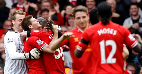 Reds relief: Steven Gerrard leads the Liverpool celebrations