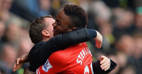 Brendan Rodgers and Raheem Sterling celebrate