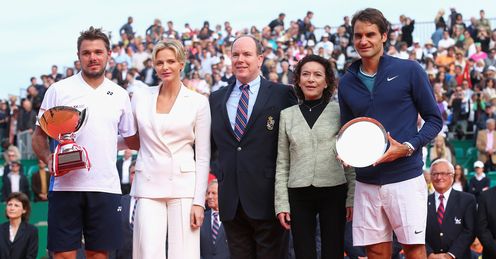 Wawrinka receives his Monte Carlo Masters trophy from Prince Albert and Princess Charlene of Monaco.