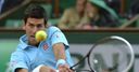 Djokovic brushes aside Sousa