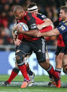 Nemani Nadolo of the Crusaders is tackled by Highlanders Nemani Nadolo of the Crusaders is tackled by Highlanders