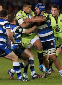 Northampton s Luther Burrell is tackled by Bath s George Ford and Leroy Houston 2014 Northampton s Luther Burrell is tackled by Bath s George Ford and Leroy Houston 2014
