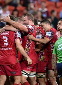 Reds pack celebrate try v Highlanders Reds pack celebrate try v Highlanders