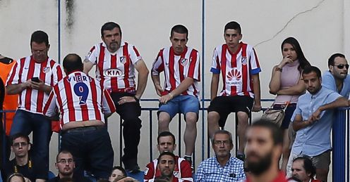 Malaga celebrate putting a dent in Atletico Madrid's title tilt