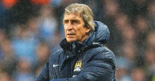 Pellegrini: looks set to win Premier League in his first season in charge