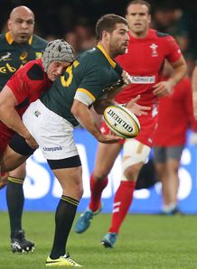Jonathan Davies of Wales with a tackle on Willie le Roux of South Africa Jonathan Davies of Wales with a tackle on Willie le Roux of South Africa