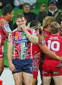 Reds celebrating Nick Frisby try against the Rebels Reds celebrating Nick Frisby try against the Rebels