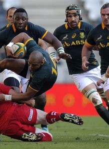 South Africa s wing Cornal Hendricks C is tackled by Wales South Africa s wing Cornal Hendricks C is tackled by Wales