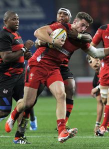 Wales wing Alex Cuthber held against Eastern Province Kings Wales wing Alex Cuthber held against Eastern Province Kings
