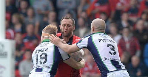 RUGBYL SALFORD SALFORD RED DEVILS' GARETH HOCK IS TACKLED BY BRADFORD BULLS RUGBYL SALFORD SALFORD RED DEVILS' GARETH HOCK IS TACKLED BY BRADFORD BULLS