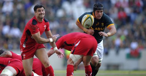 WALES SCRUM-HALF MIKE PHILLIPS (L) CLEARS THE BALL OUT OF A SCRUM WALES SCRUM-HALF MIKE PHILLIPS (L) CLEARS THE BALL OUT OF A SCRUM