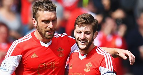 Lambert and Lallana: will be wearing the red of Liverpool on opening day of the season