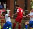 Leyton Orient's Romain Vincelot (centre) scores the opening goal past QPR's Steven Caulker (left) and Richard Dunn (right), friendly