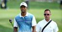 Woods splits with coach