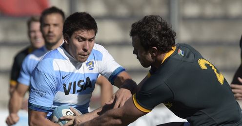 ARGENTINA'S LOS PUMAS' WING LUCAS GONZALEZ AMOROSINO (L) RUNS THROUGH A TACKLE BY SOUTH AFRICA'S SPRINGBOKS' HOOKER BISMARCK DU PLESSIS ARGENTINA'S LOS PUMAS' WING LUCAS GONZALEZ AMOROSINO (L) RUNS THROUGH A TACKLE BY SOUTH AFRICA'S SPRINGBOKS' HOOKER BISMARCK DU PLESSIS