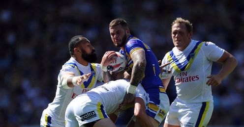 RUGBY LEAGUE ZAK HARDAKER OF LEEDS RHINOS IS TACKLED BY STEFAN RATCHFORD AND ROY ASOTASI WARRINGTON WOLVES DURING THE TETLEY'S CHALLENGE CUP SEMI FINAL RUGBY LEAGUE ZAK HARDAKER OF LEEDS RHINOS IS TACKLED BY STEFAN RATCHFORD AND ROY ASOTASI WARRINGTON WOLVES DURING THE TETLEY'S CHALLENGE CUP SEMI FINAL