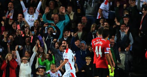 MK Dons celebrated a famous win over Man Utd in the Capital One Cup on Tuesday