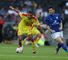 Dele Alli: Holds off goalscorer David Nugent in MK Dons' friendly defeat