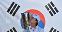 Kim clinches Evian crown