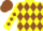 Yellow, brown diamonds, brown 's', brown diamonds on sleeves, yellow and brown cap