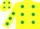 Yellow body, dark green spots, yellow arms, dark green spots, yellow cap, dark green spots