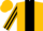 Gold, white and black crest on black panel, black stripe on sleeves, gold cap