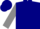 Navy blue, grey 'jga' on back, navy blue bars on grey sleeves