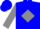 Blue, blue 'vc' on gray diamond on back, blue 'vuc' on gray sleeves