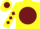 Yellow, yellow 'd' on burgundy ball, burgundy diamonds on sleeves