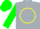 Navy, silver stag and crown in yellow circle, green sleeves, green and navy cap