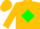 Gold, gold 'cd' on red framed hunter green diamond