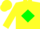 Yellow body, green diamond, yellow arms, yellow cap, green hooped