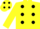 yellow, black spots and cap