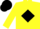Yellow body, black diamond, yellow arms, black cap