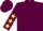 Maroon, yellow stars on sleeves
