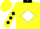Yellow, white diamond, black 'r' and collar, black diamonds on sleeves
