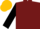 Burgundy, black and gold emblem, black sleeves, black and gold cap