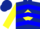 Dark blue, yellow diamond, blue chevrons on yellow sleeves, dark blue cap