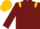 Burgundy, gold epaulettes and cap