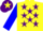 Yellow, purple stars, blue sleeves, purple cap, yellow star