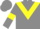 Grey body, yellow chevron, grey arms, yellow armlets, grey cap, yellow hooped