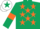 Dark green, orange stars and armlets, white cap, dark green star