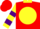 Red, yellow ball, purple 't', yellow collar, yellow and purple hoops on sleeves