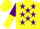 Yellow, purple stars, purple and yellow halved sleeves, yellow cap, purple peak