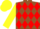 Brown, red diamonds, yellow sleeves and cap